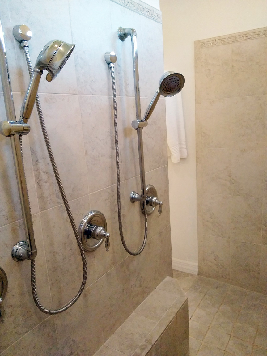 Primary Shower with 2 Handheld Sprayers and a Rain Shower